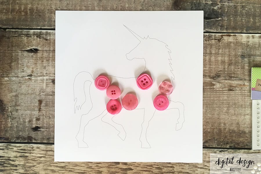 Large buttons on unicorn silhouette