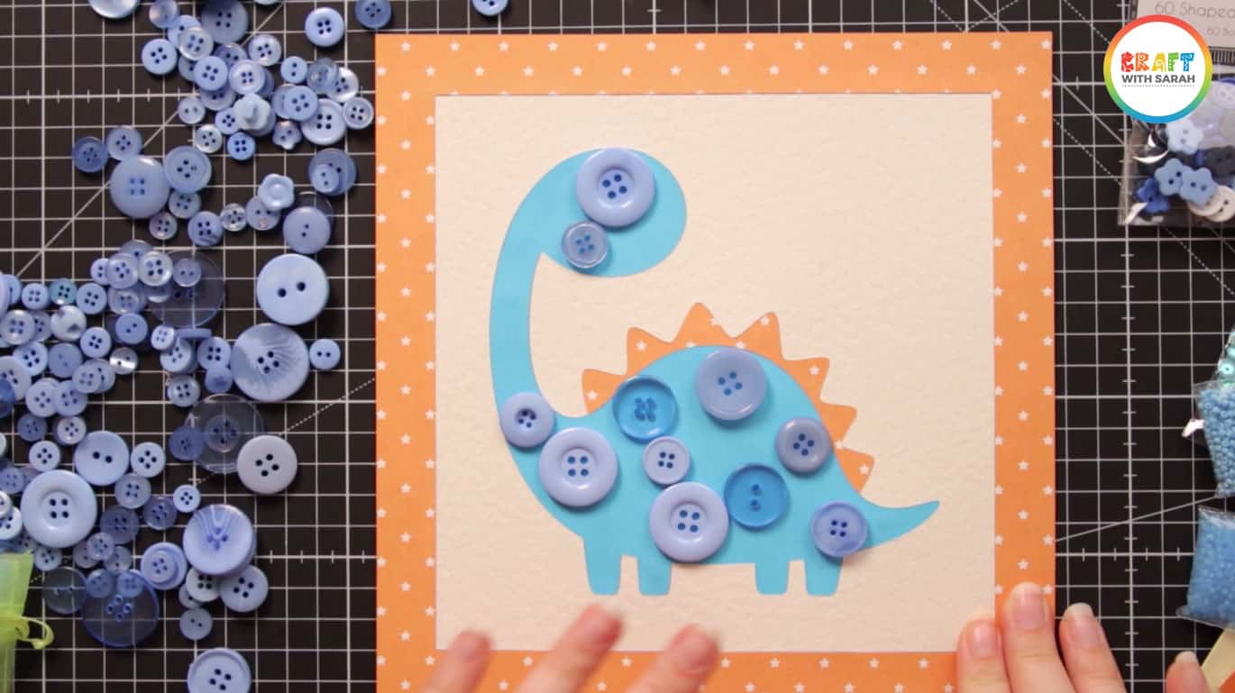 Large buttons on dinosaur button art