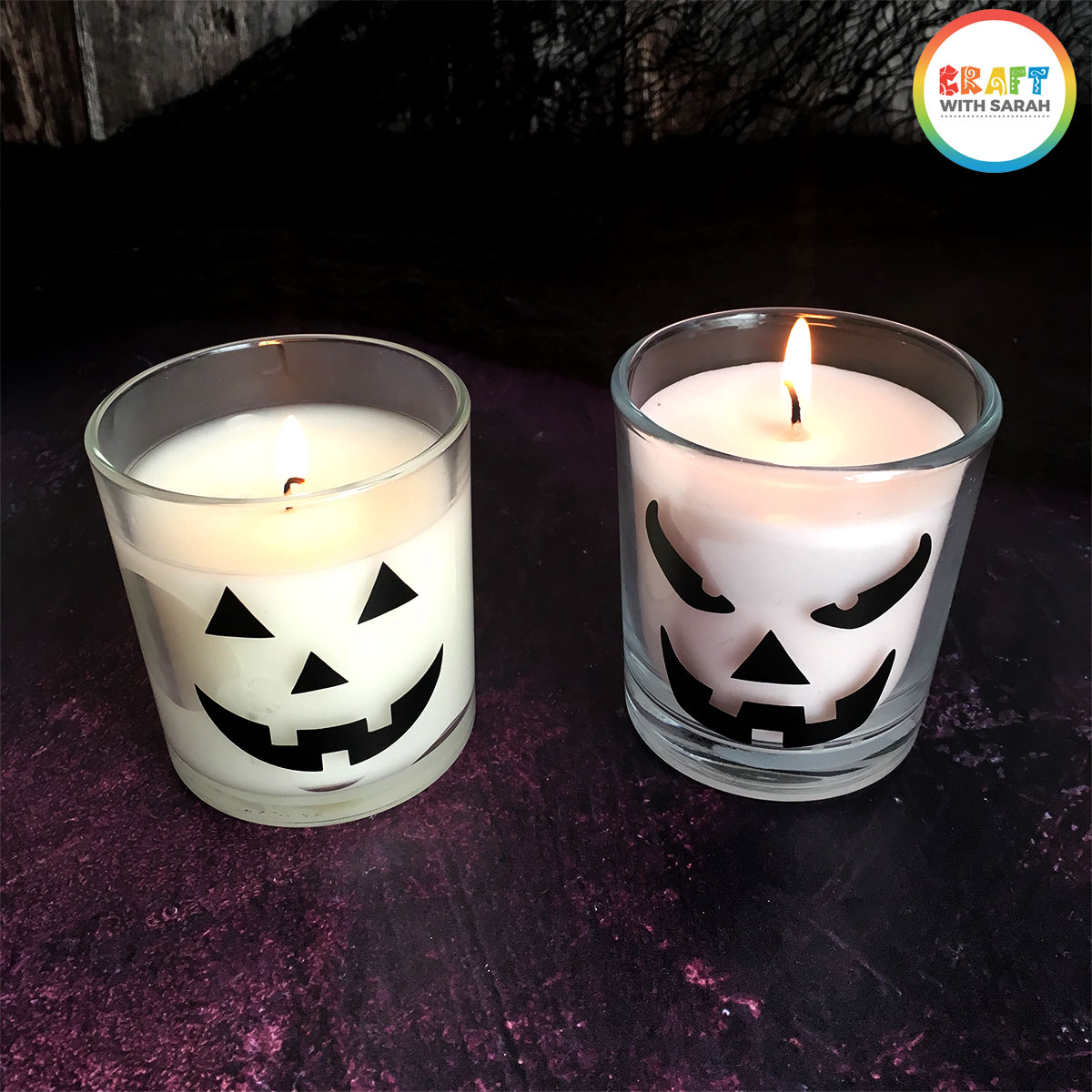 Pumpkin faces added to candles