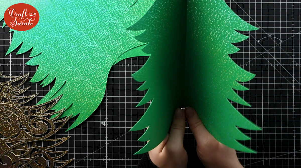 Valley fold along the score line