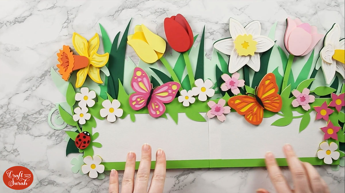 Finished flowers on the spring welcome sign